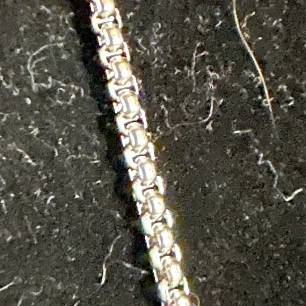 Stainless steel necklace with box chain. 22 inch chain. Quarter for size ref